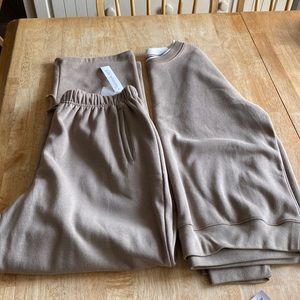 Sweat pants and sweat shirt set. Brand new with tags!